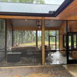 Fully enclosed patio with Mountain View Screens providing clear, unobstructed outdoor views.